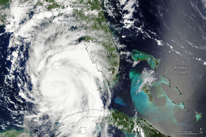 Satellite view of a hurricane swirling over Cuba and approaching Florida in the Atlantic.