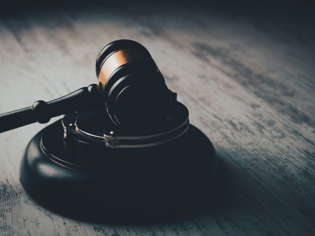 a judge's gaven on a wooden table