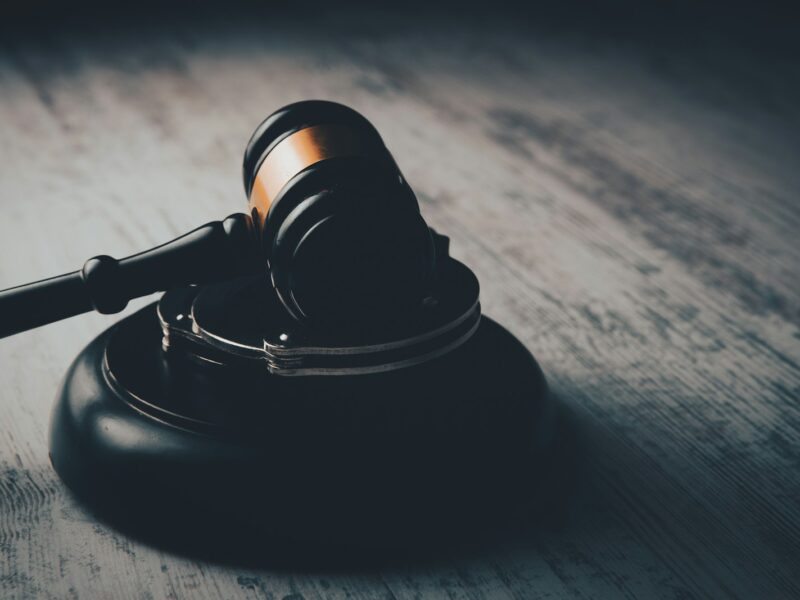 a judge's gaven on a wooden table