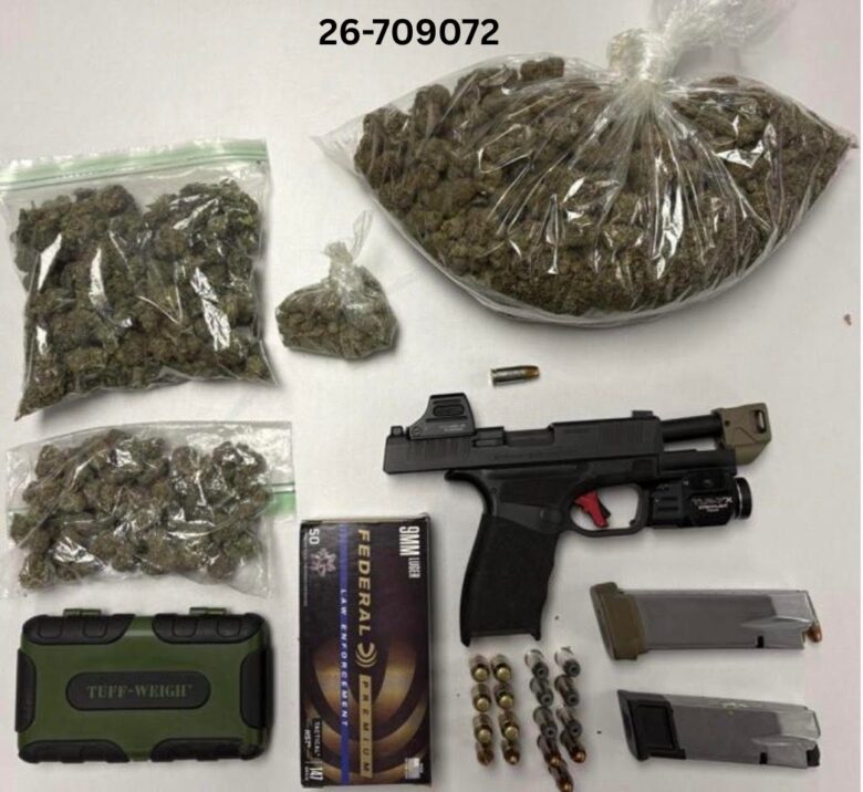 Bagged cannabis, handgun, ammunition, and magazines laid out on a white surface.