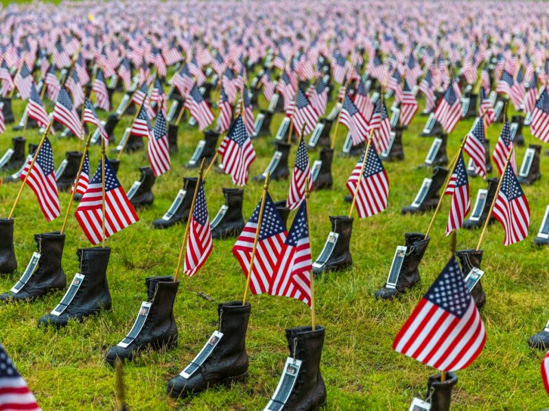 USA flag in black boots lot